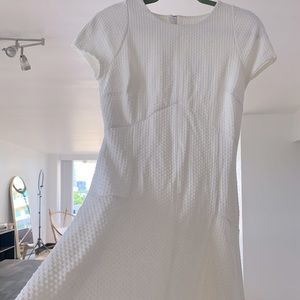 New with tags. Beautiful and practical Banana Republic white midi dress.